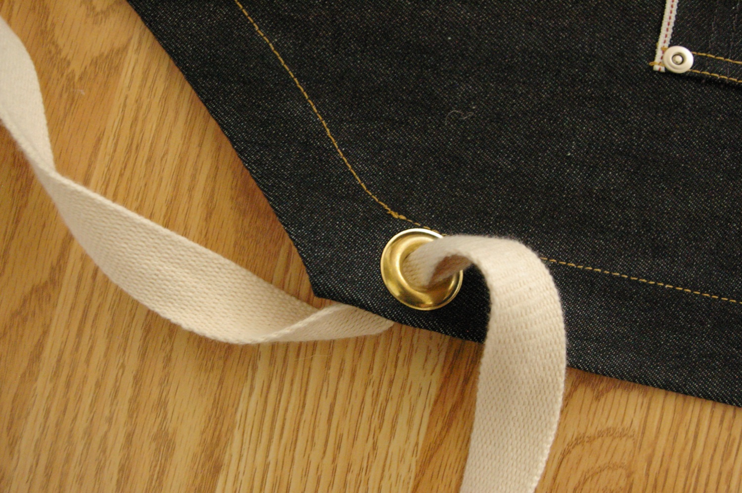 Apron, grommet